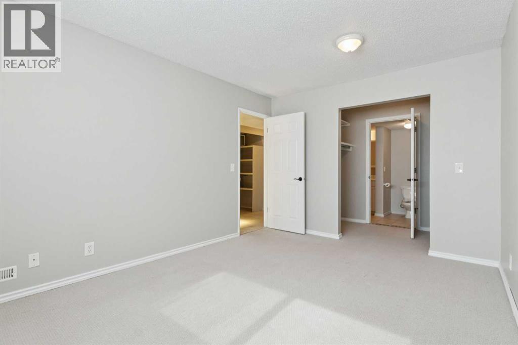 102, 7416 Hunterview Drive Nw, Calgary, Alberta  T2K 5J2 - Photo 18 - A2256834