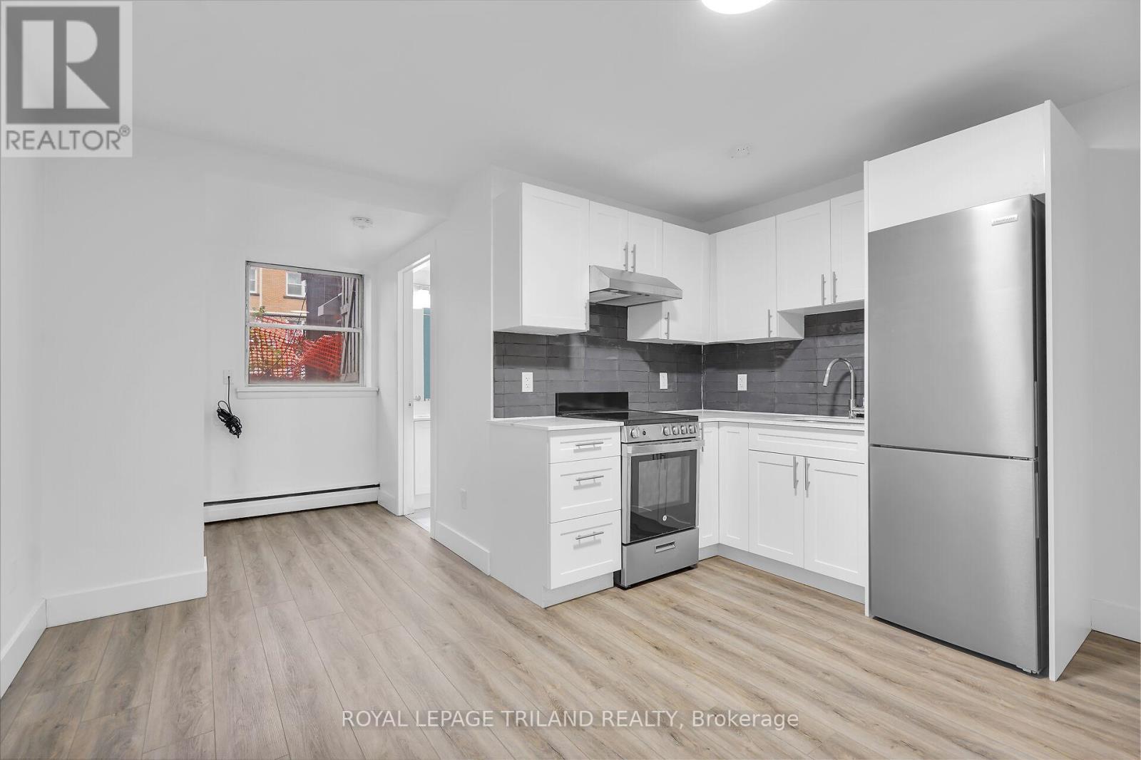 E - 20 Craig Street, London South, Ontario  N6C 1E8 - Photo 3 - X12530474