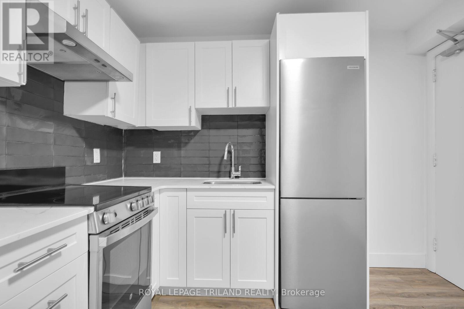 E - 20 Craig Street, London South, Ontario  N6C 1E8 - Photo 5 - X12530474