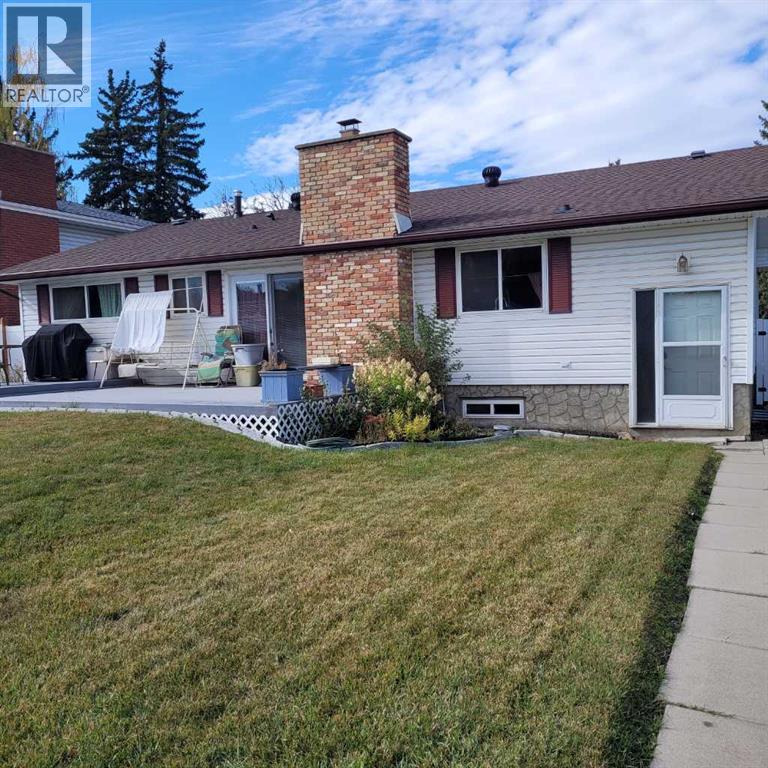 12008 Elbow Drive Sw, Calgary, Alberta  T2W 1H2 - Photo 2 - A2269896