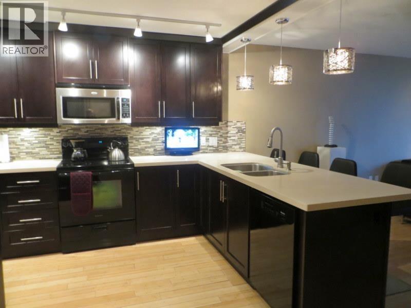 203 4323 Gallant Avenue, North Vancouver, British Columbia  V7G 2C1 - Photo 3 - R3066295