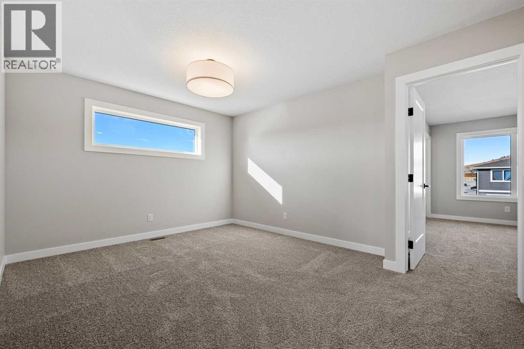 85 Quartz Crescent, Cochrane, Alberta  T4C 3G2 - Photo 17 - A2269392