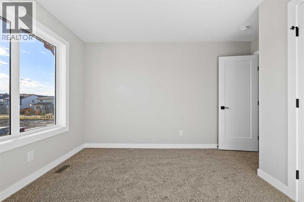 85 Quartz Crescent, Cochrane, Alberta  T4C 3G2 - Photo 29 - A2269392