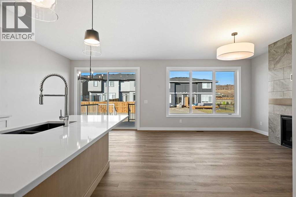 85 Quartz Crescent, Cochrane, Alberta  T4C 3G2 - Photo 3 - A2269392