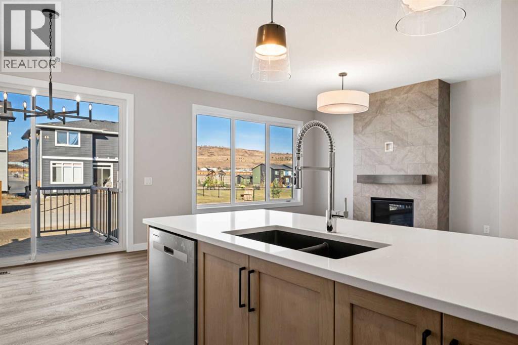 85 Quartz Crescent, Cochrane, Alberta  T4C 3G2 - Photo 9 - A2269392