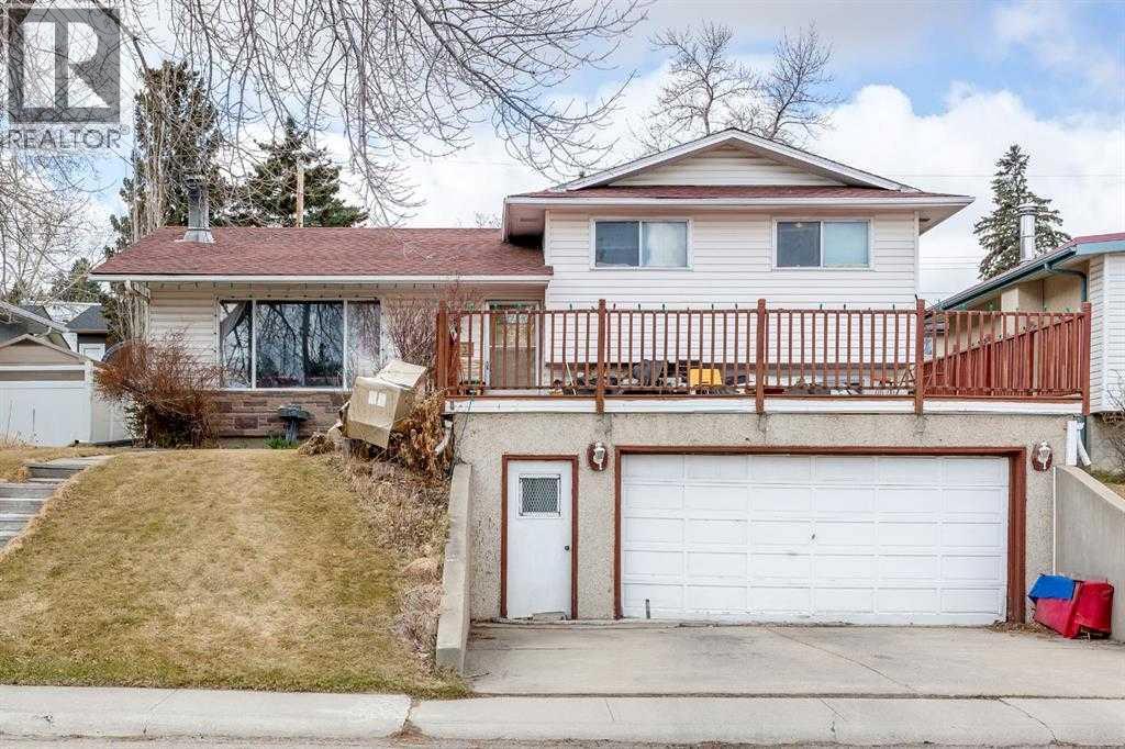 7803 Hunterslea Crescent Nw, Calgary, Alberta  T2K 4M3 - Photo 1 - A2267488