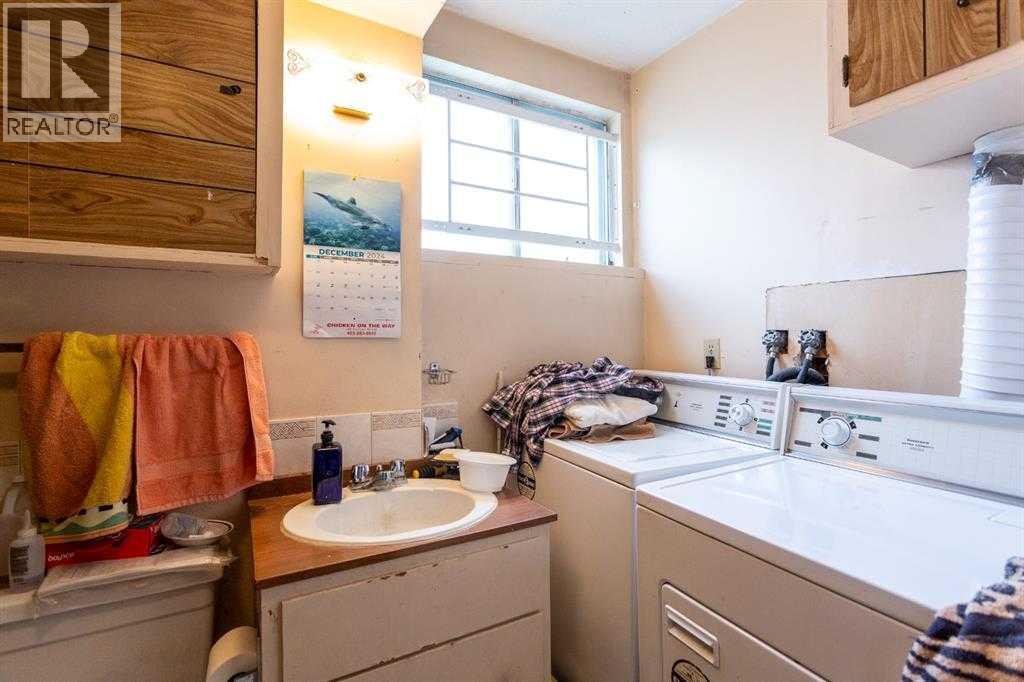 7803 Hunterslea Crescent Nw, Calgary, Alberta  T2K 4M3 - Photo 10 - A2267488