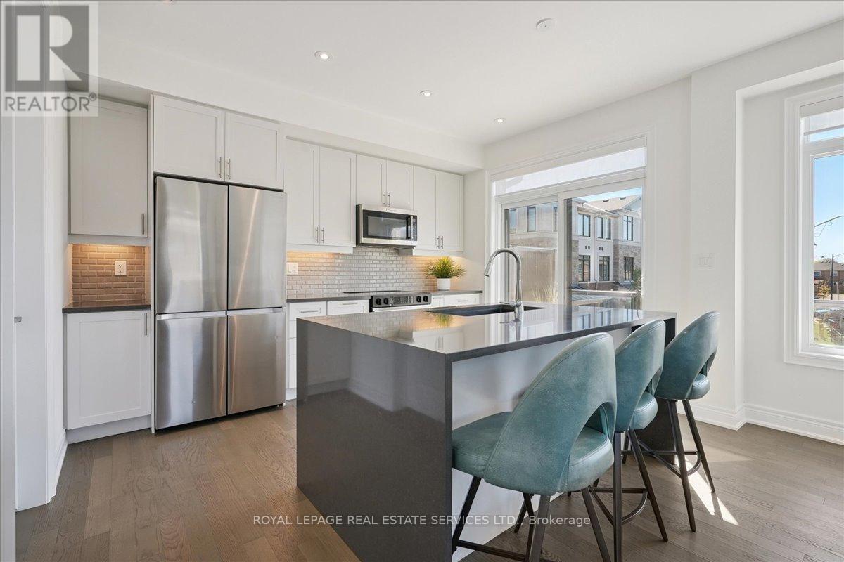 2180 Postmaster Drive, Oakville, Ontario  L6M 5T1 - Photo 6 - W12437859