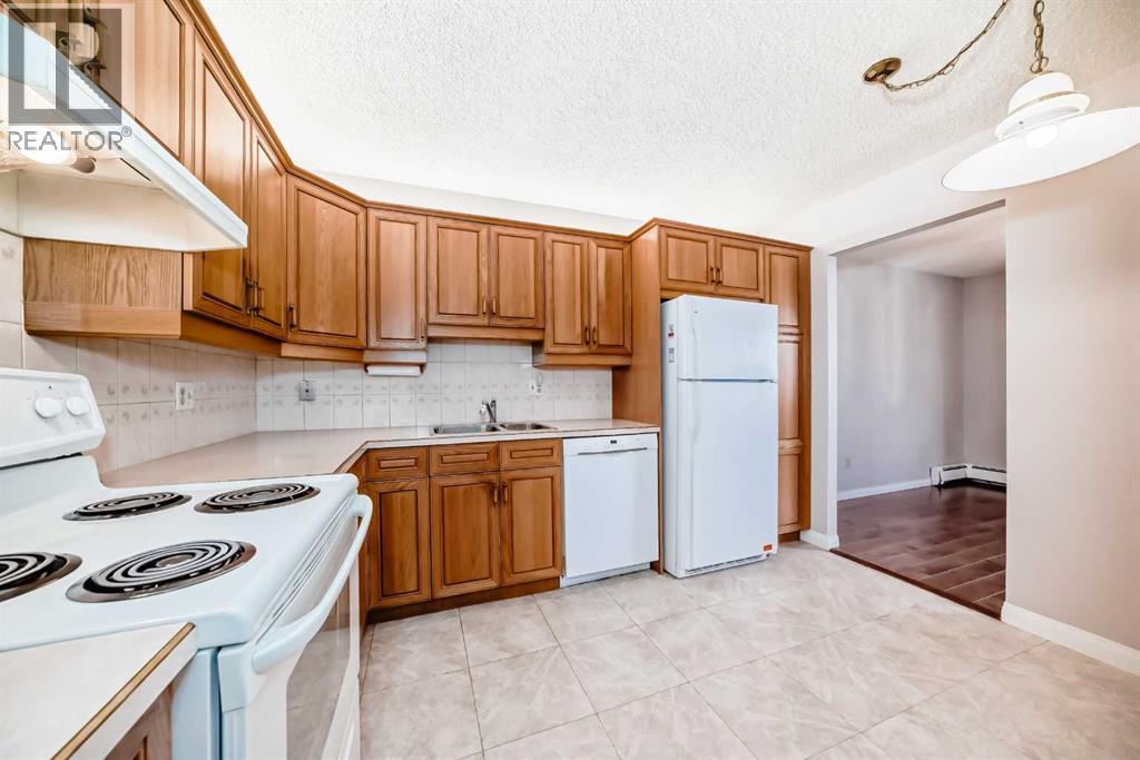 Property at 301, 521 57 Avenue SW image 2