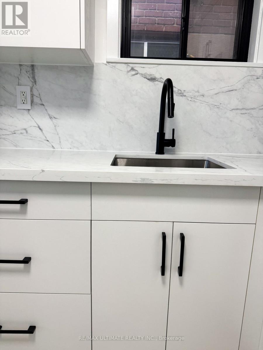 Lower - 8 Carrington Avenue, Toronto, Ontario  M6E 2C3 - Photo 13 - W12530620