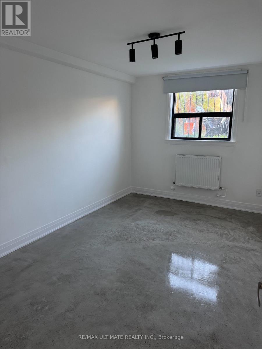 Lower - 8 Carrington Avenue, Toronto, Ontario  M6E 2C3 - Photo 9 - W12530620