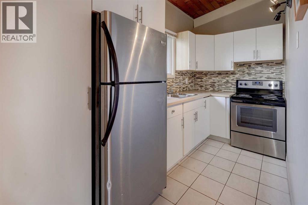 529 Sabrina Road Sw, Calgary, Alberta  T2T 4M9 - Photo 12 - A2263652