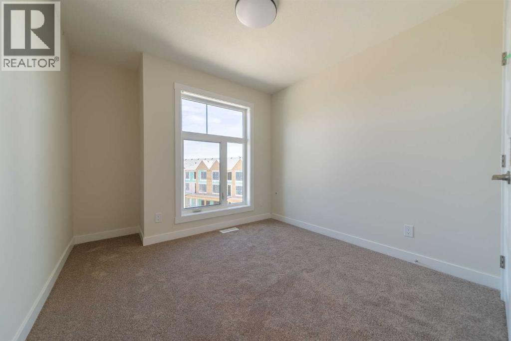 707 Sovereign Common Sw, Calgary, Alberta  T3C 3Y3 - Photo 18 - A2232784