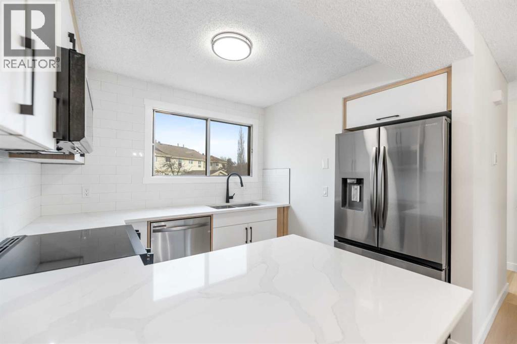 14 Woodhill Road Sw, Calgary, Alberta  T2W 3P2 - Photo 13 - A2269834