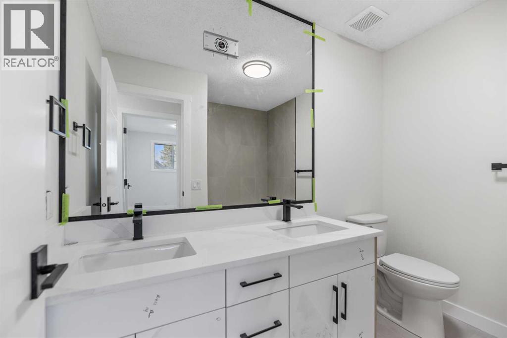 14 Woodhill Road Sw, Calgary, Alberta  T2W 3P2 - Photo 24 - A2269834