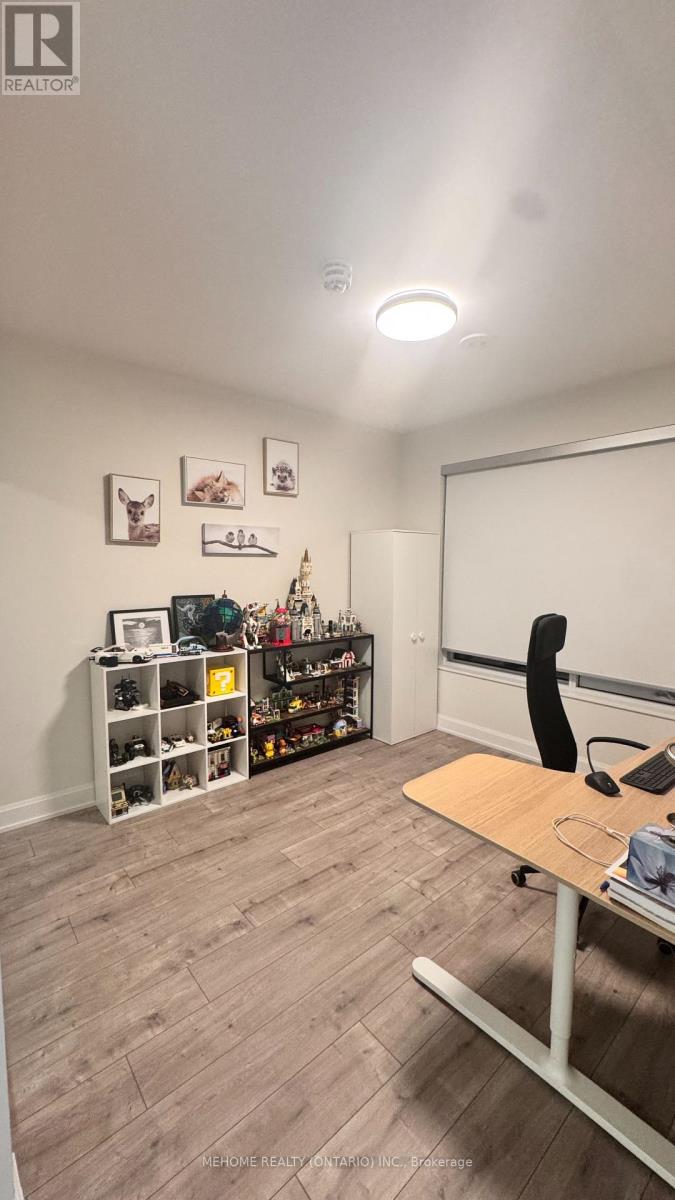 606 - 18 Water Walk Drive, Markham, Ontario  L3R 6L5 - Photo 6 - N12531530