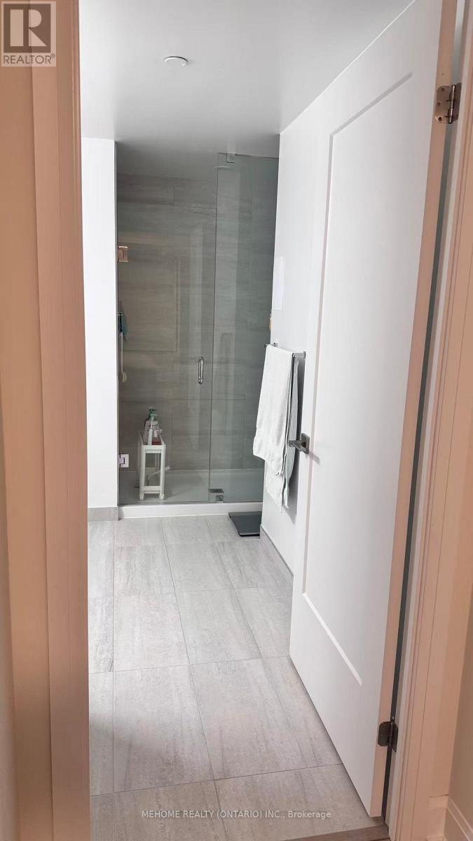 606 - 18 Water Walk Drive, Markham, Ontario  L3R 6L5 - Photo 8 - N12531530