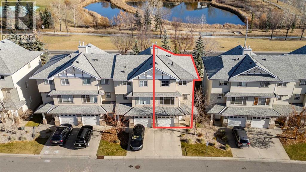 84 Crystal Shores Cove, Okotoks, Alberta  T1S 2B4 - Photo 1 - A2268390