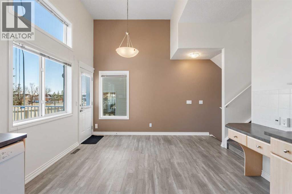 84 Crystal Shores Cove, Okotoks, Alberta  T1S 2B4 - Photo 11 - A2268390