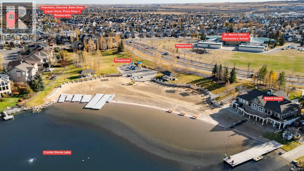 84 Crystal Shores Cove, Okotoks, Alberta  T1S 2B4 - Photo 5 - A2268390