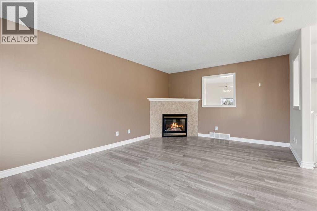 84 Crystal Shores Cove, Okotoks, Alberta  T1S 2B4 - Photo 21 - A2268390