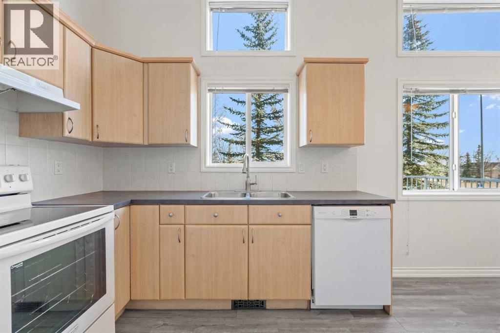 84 Crystal Shores Cove, Okotoks, Alberta  T1S 2B4 - Photo 18 - A2268390