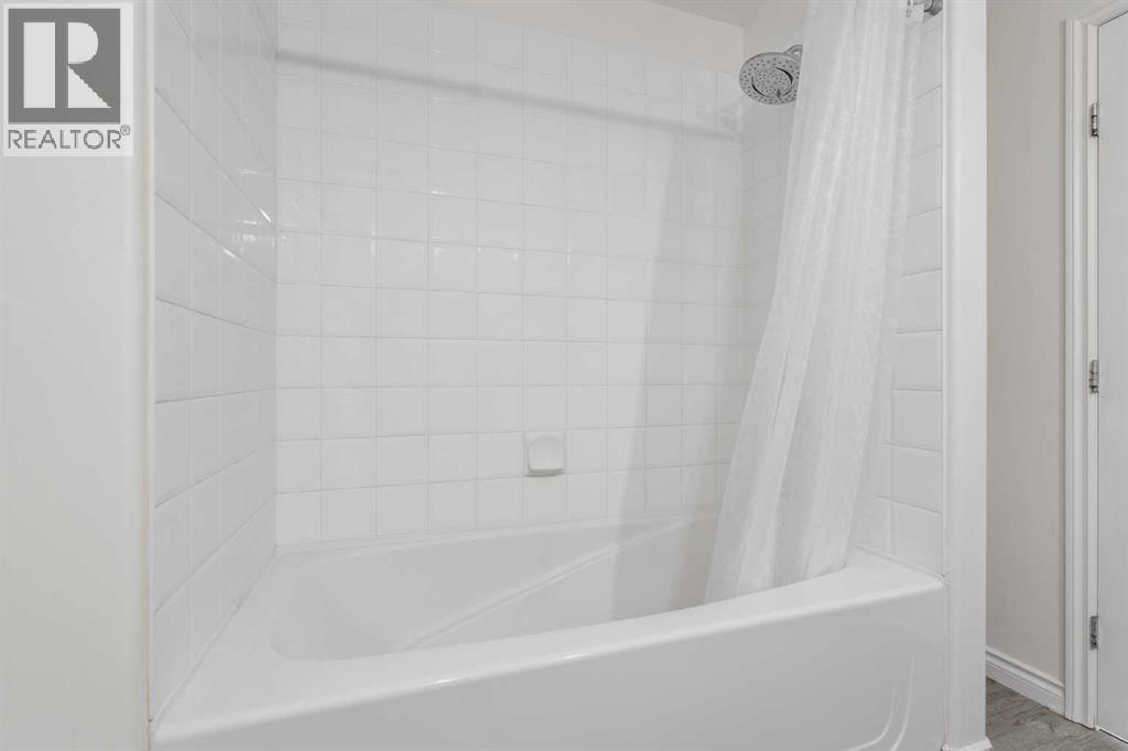 84 Crystal Shores Cove, Okotoks, Alberta  T1S 2B4 - Photo 28 - A2268390