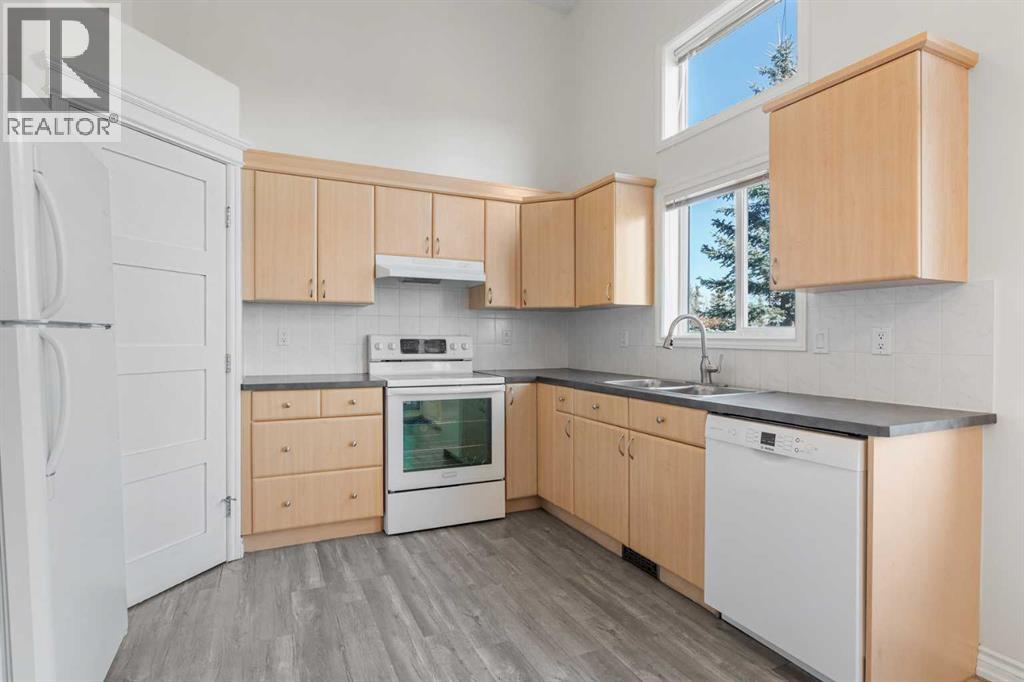 84 Crystal Shores Cove, Okotoks, Alberta  T1S 2B4 - Photo 17 - A2268390