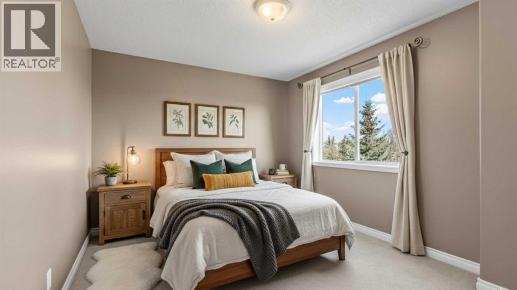 84 Crystal Shores Cove, Okotoks, Alberta  T1S 2B4 - Photo 36 - A2268390