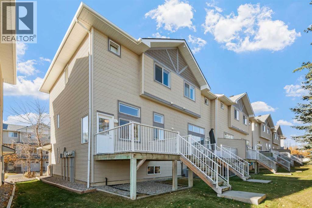 84 Crystal Shores Cove, Okotoks, Alberta  T1S 2B4 - Photo 44 - A2268390