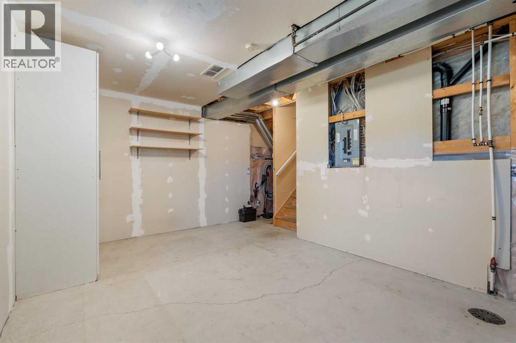 84 Crystal Shores Cove, Okotoks, Alberta  T1S 2B4 - Photo 40 - A2268390