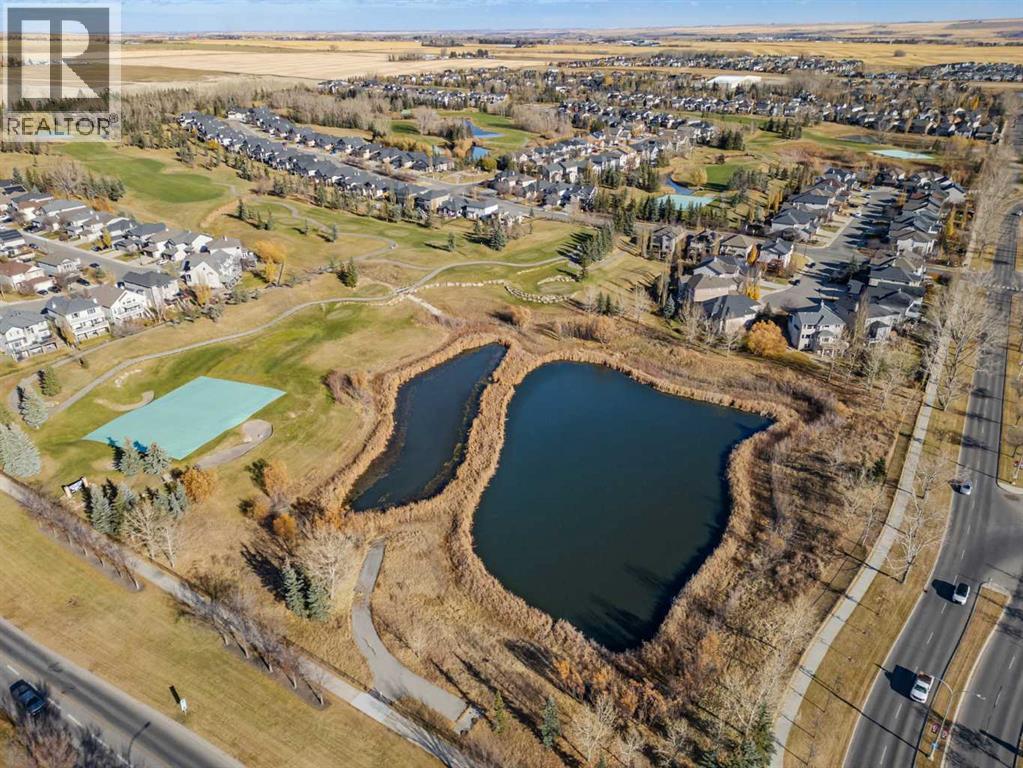 84 Crystal Shores Cove, Okotoks, Alberta  T1S 2B4 - Photo 50 - A2268390