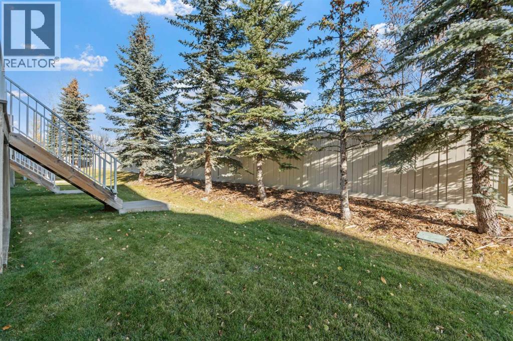 84 Crystal Shores Cove, Okotoks, Alberta  T1S 2B4 - Photo 45 - A2268390
