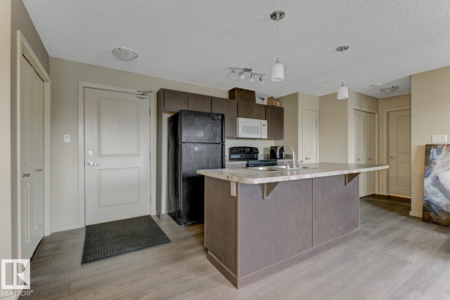 1196 Hyndman Rd Nw, Edmonton, Alberta  T5A 0P8 - Photo 5 - E4465362