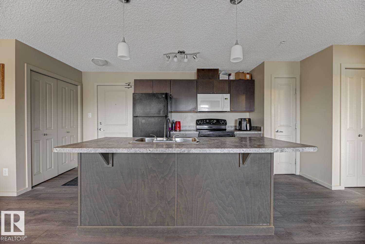 1196 Hyndman Rd Nw, Edmonton, Alberta  T5A 0P8 - Photo 6 - E4465362