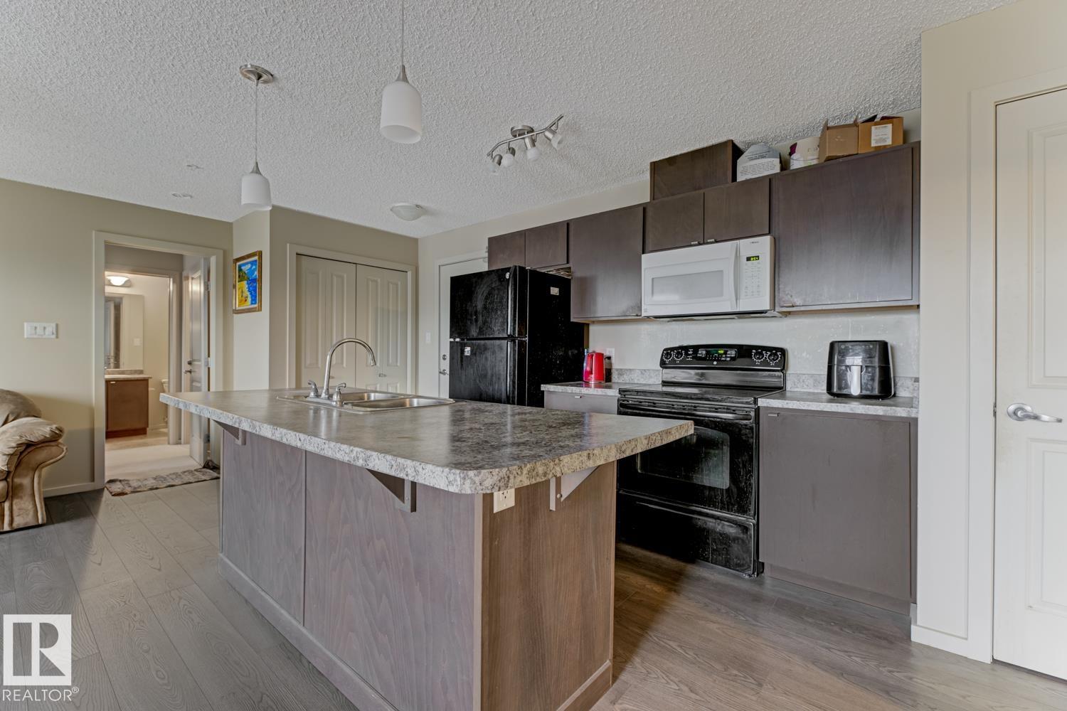 1196 Hyndman Rd Nw, Edmonton, Alberta  T5A 0P8 - Photo 7 - E4465362