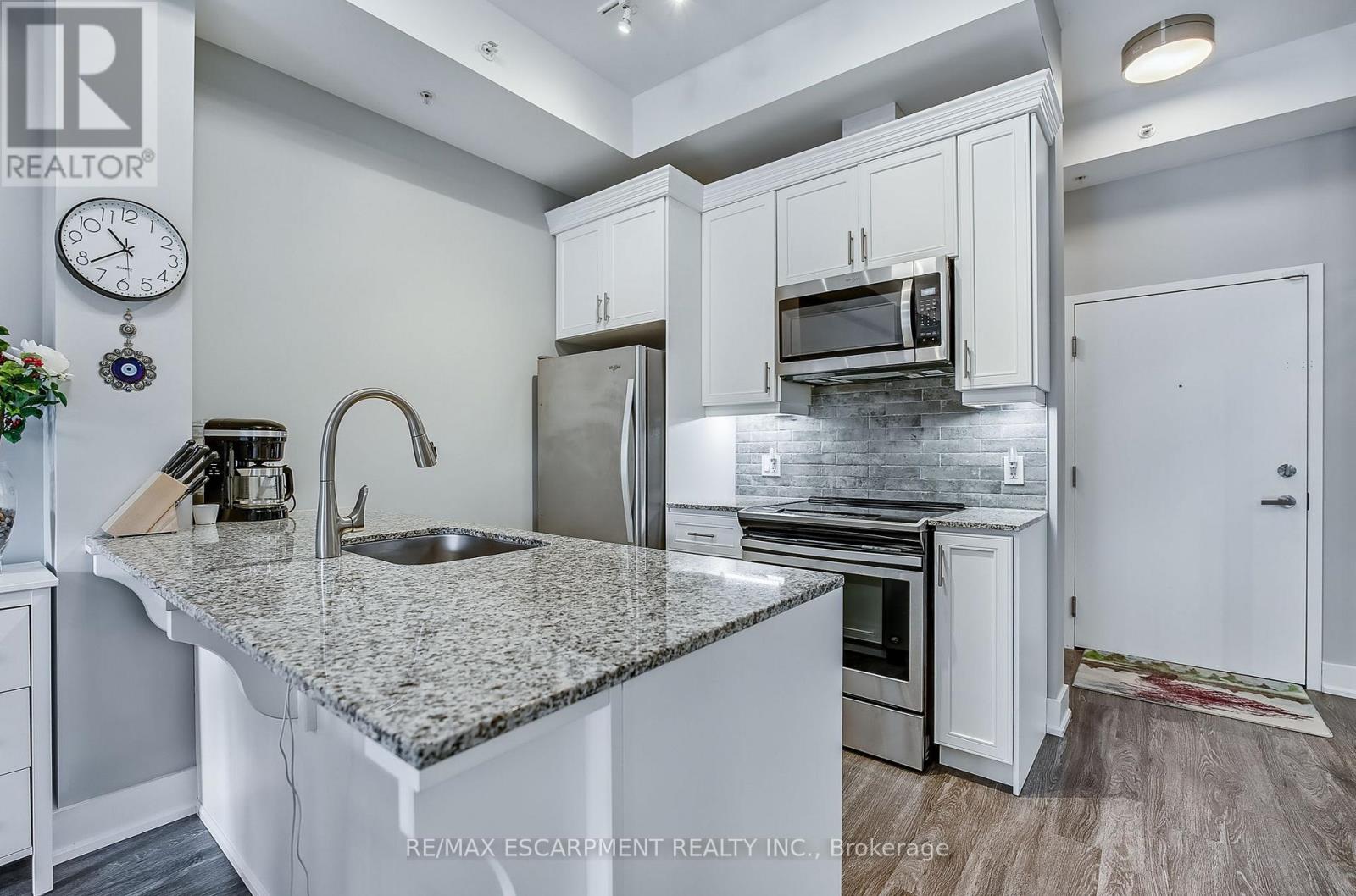 103 - 4040 Upper Middle Road, Burlington, Ontario  L7M 0H2 - Photo 2 - W12532054