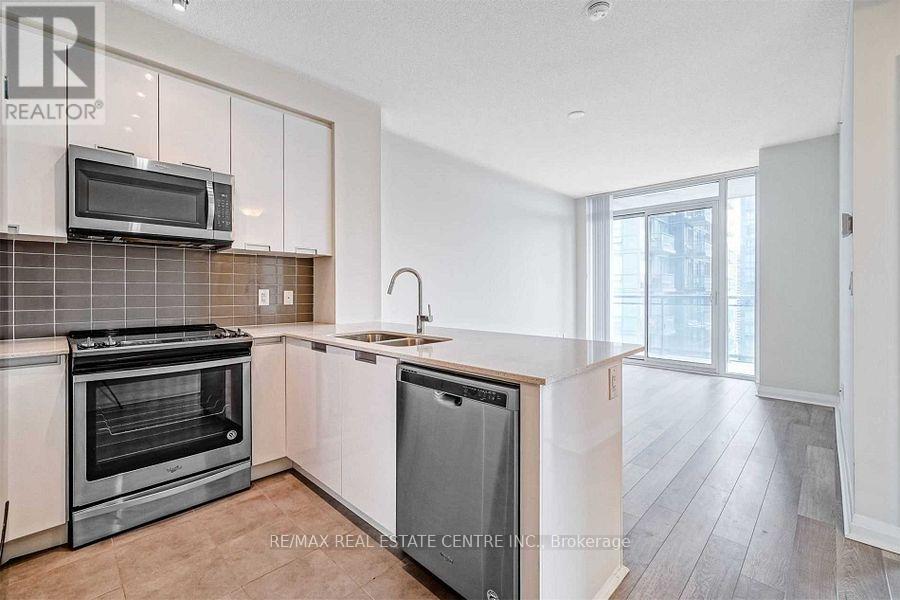 1911 - 5033 Four Spring Ave Avenue, Mississauga (Hurontario), Ontario  L5R 0G6 - Photo 3 - W12531272