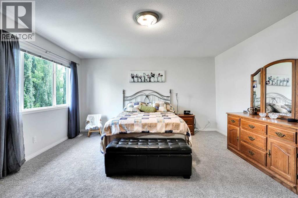 521 Rocky Ridge View Nw, Calgary, Alberta  T3G 4X3 - Photo 33 - A2267186