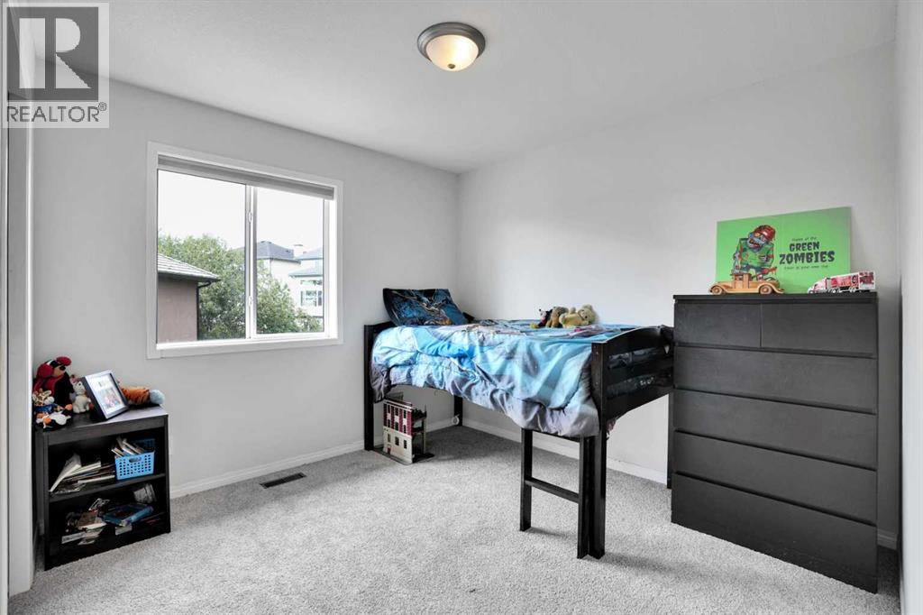 521 Rocky Ridge View Nw, Calgary, Alberta  T3G 4X3 - Photo 28 - A2267186