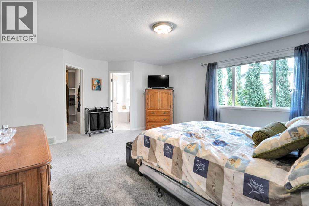 521 Rocky Ridge View Nw, Calgary, Alberta  T3G 4X3 - Photo 35 - A2267186