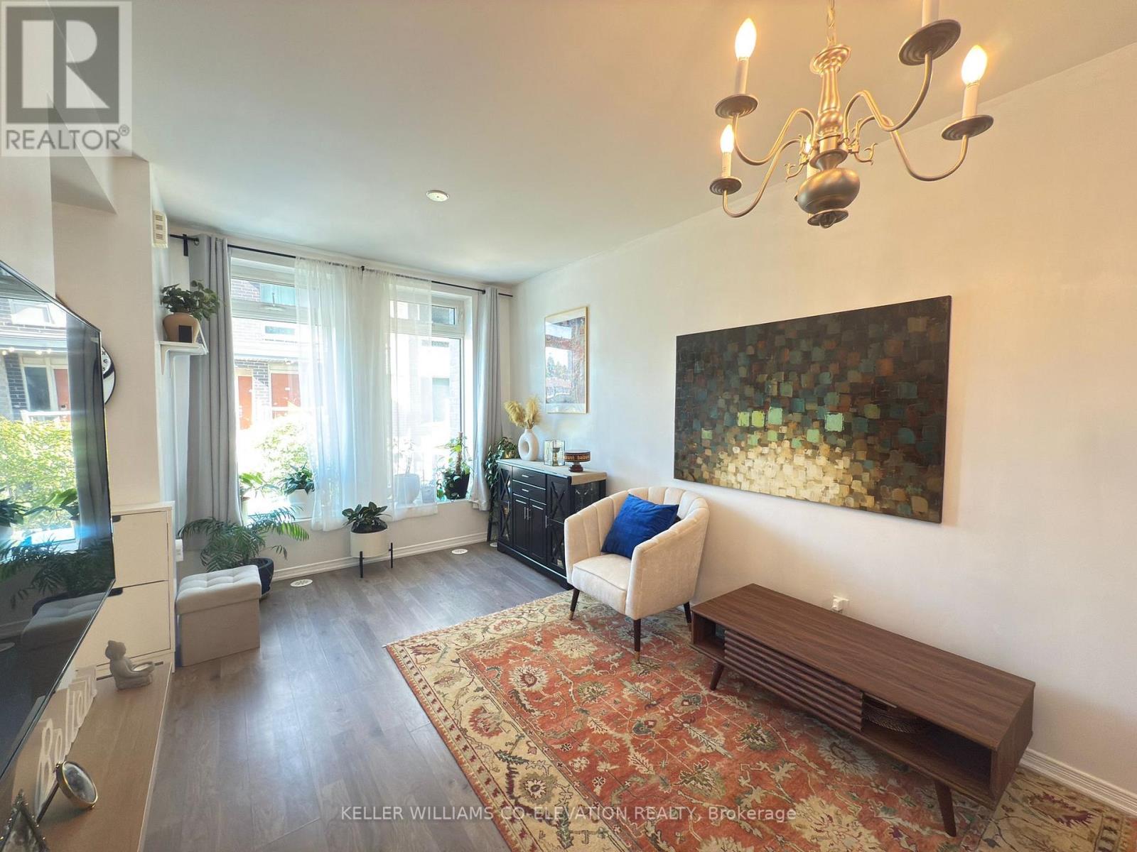 112 - 11 Applewood Lane, Toronto, Ontario  M9C 2Z7 - Photo 3 - W12532430