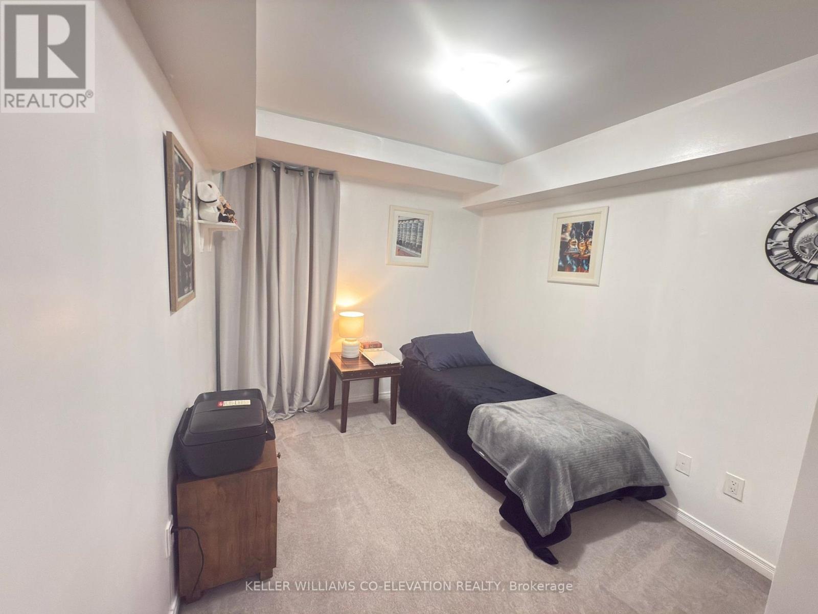 112 - 11 Applewood Lane, Toronto, Ontario  M9C 2Z7 - Photo 9 - W12532430