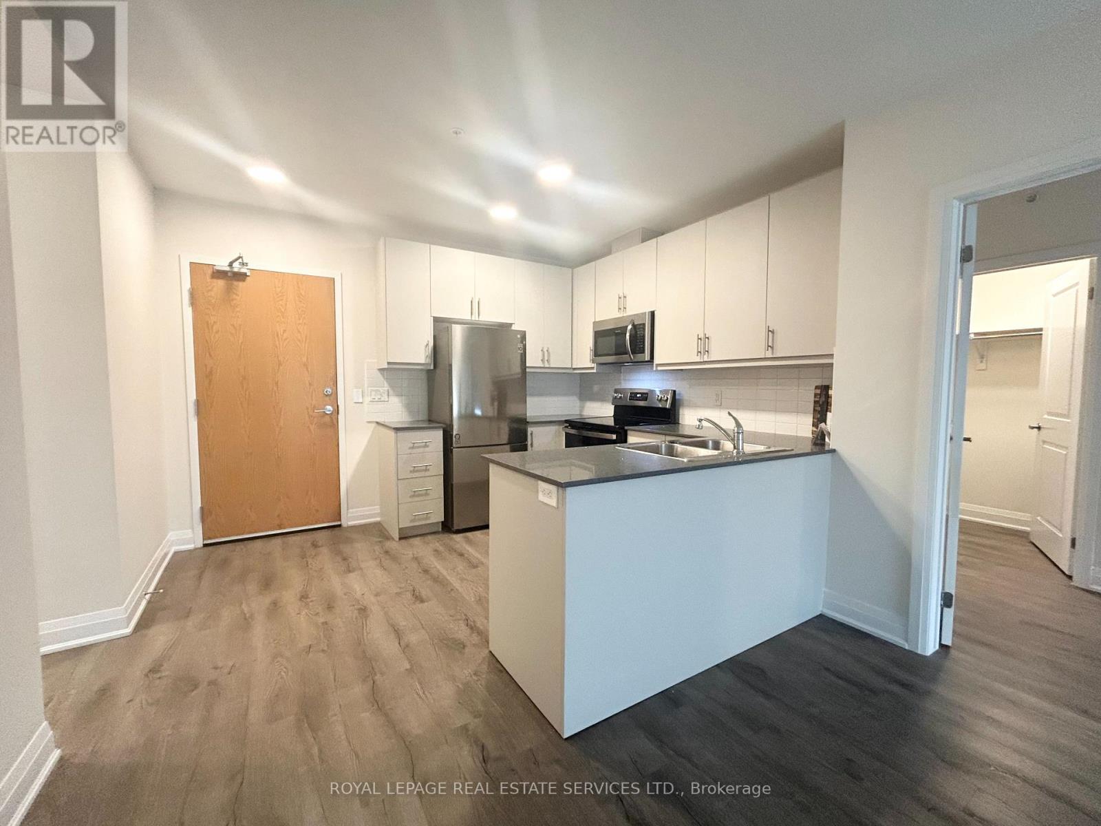 110 - 1287 Costigan Road, Milton, Ontario  L9T 9M6 - Photo 2 - W12532786