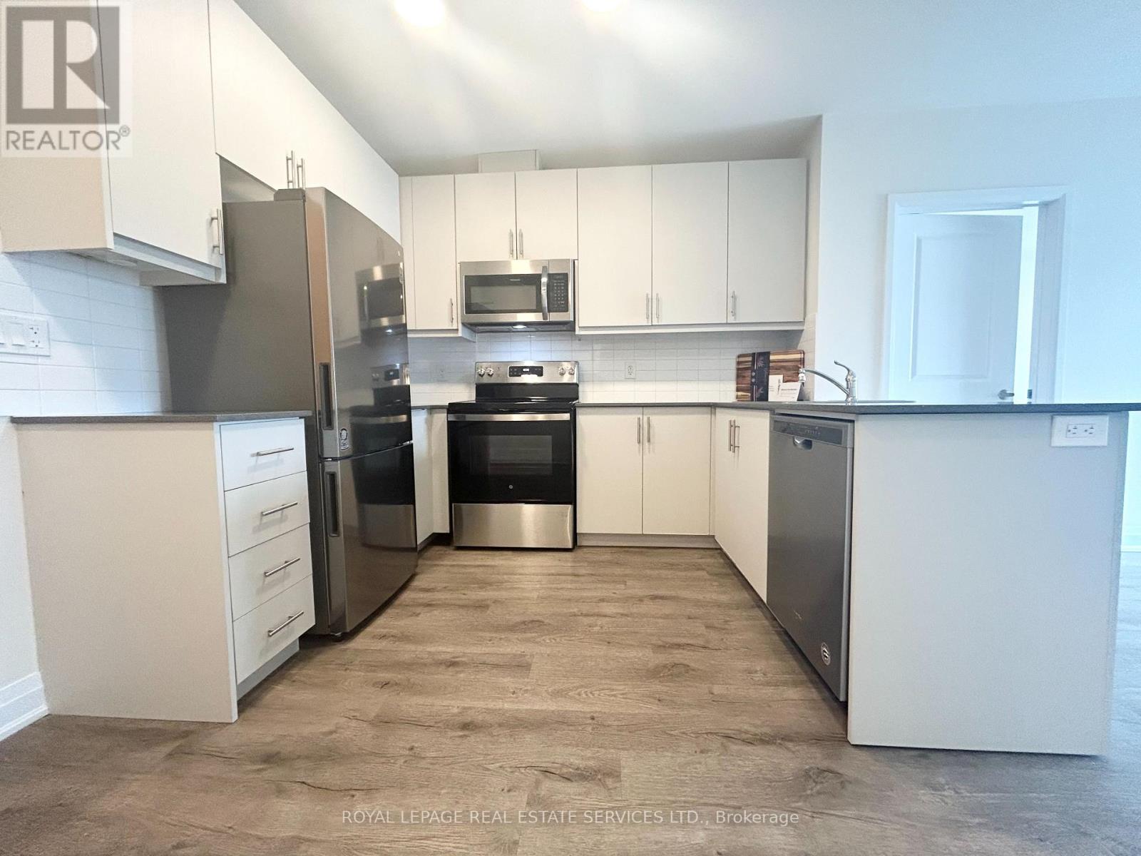 110 - 1287 Costigan Road, Milton, Ontario  L9T 9M6 - Photo 3 - W12532786