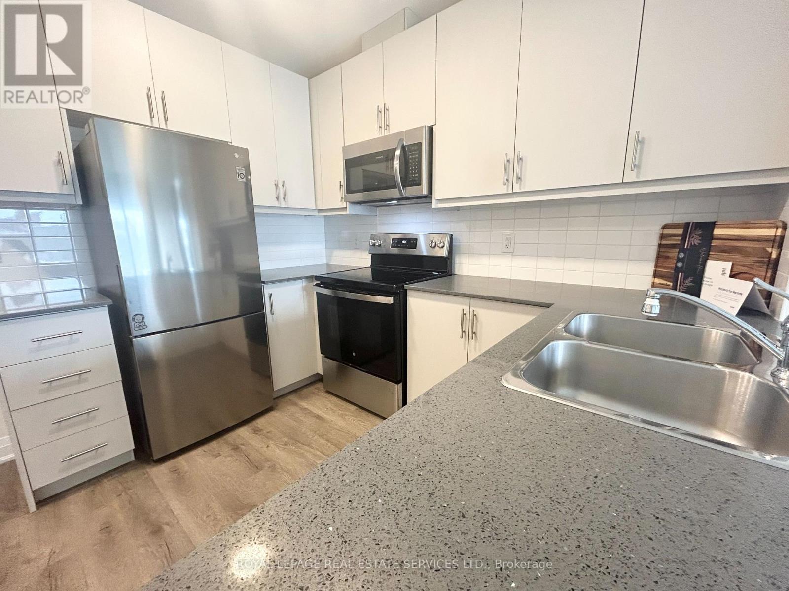 110 - 1287 Costigan Road, Milton, Ontario  L9T 9M6 - Photo 4 - W12532786