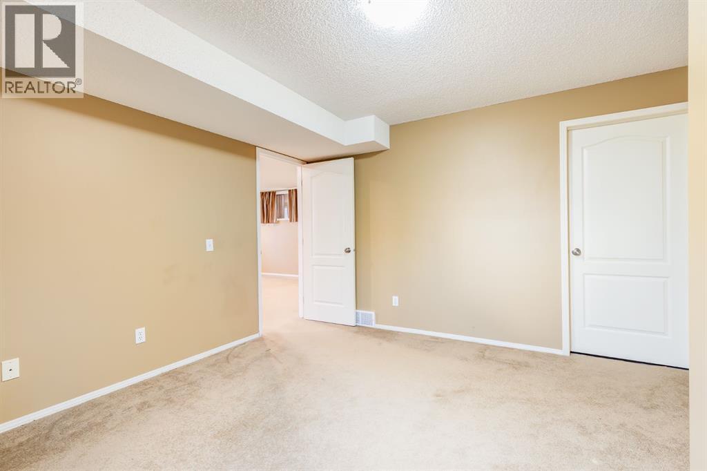 1808 Meadowbrook Gate Se, Airdrie, Alberta  T4A 2B4 - Photo 32 - A2269704