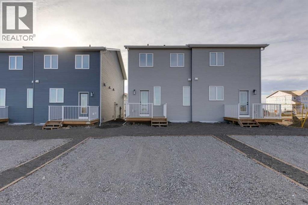 8542 Huxbury Drive Ne, Calgary, Alberta  T2A 4Y1 - Photo 5 - A2247736