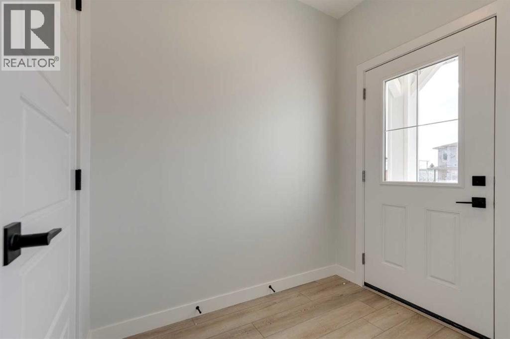 8542 Huxbury Drive Ne, Calgary, Alberta  T2A 4Y1 - Photo 6 - A2247736