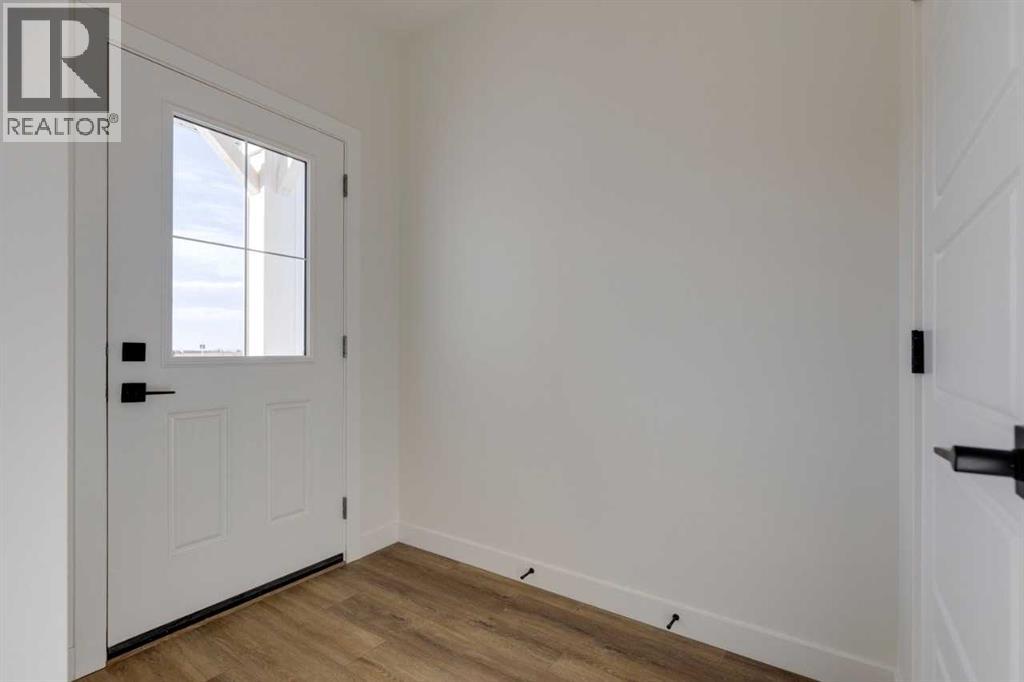 8546 Huxbury Drive Ne, Calgary, Alberta  T2A 4Y1 - Photo 6 - A2247764